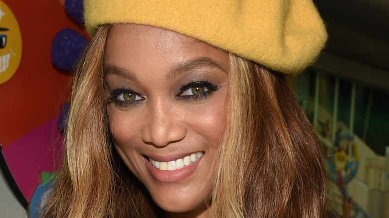 Tyra Banks smiles for the camera.