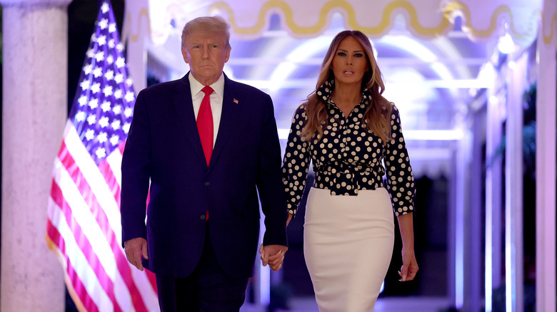 Donald and Melania Trump walking