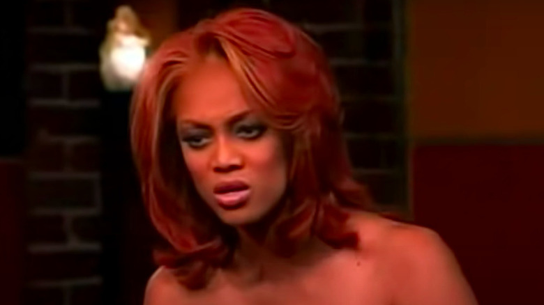 Tyra Banks staring at contestant