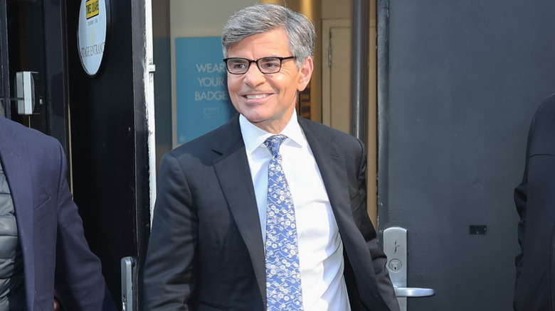 George Stephanopoulos leaving building smiling