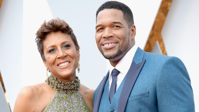 Robin Roberts and Michael Strahan smiling