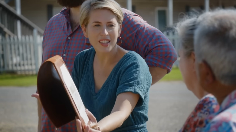 Erin Napier showing couple a drawing