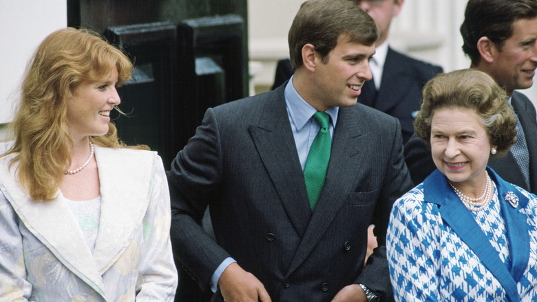 Sarah Ferguson, Prince Andrew, and Queen Elizabeth II talking