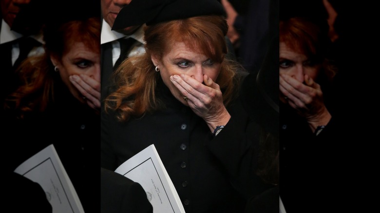 Sarah Ferguson with her hand over her mouth