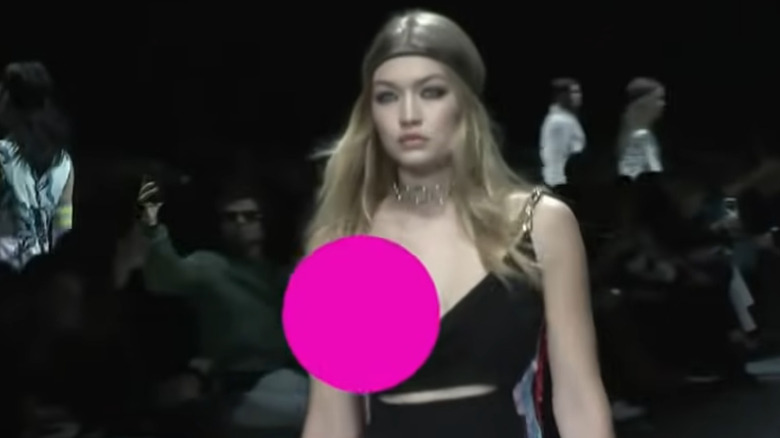 Gigi Hadid's dress slips on the runway