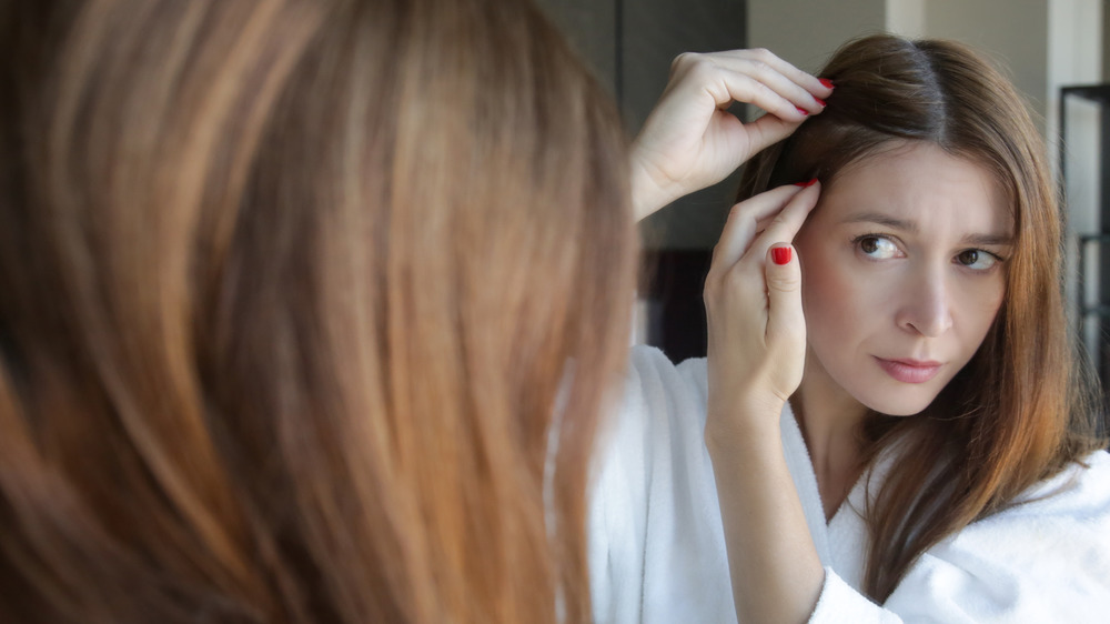 A woman dealing with dry scalp