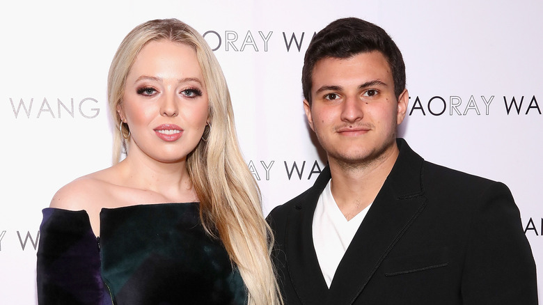 Tiffany Trump and Michael Boulos posing