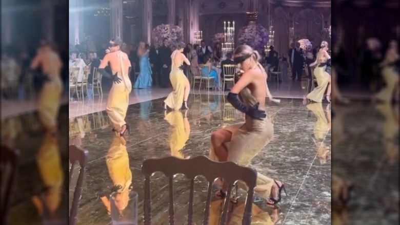 Blindfolded dancers at Tiffany Trump's wedding