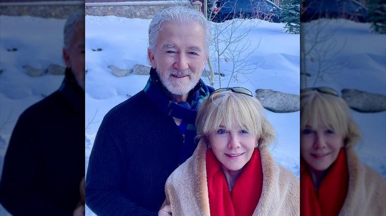 Linda Purl and Patrick Duffy smiling in the snow