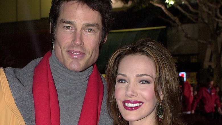 Ronn Moss and Hunter Tylo posing