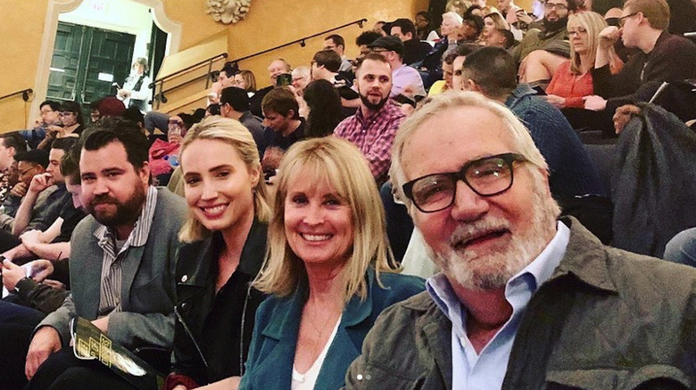 John McCook smiling with family