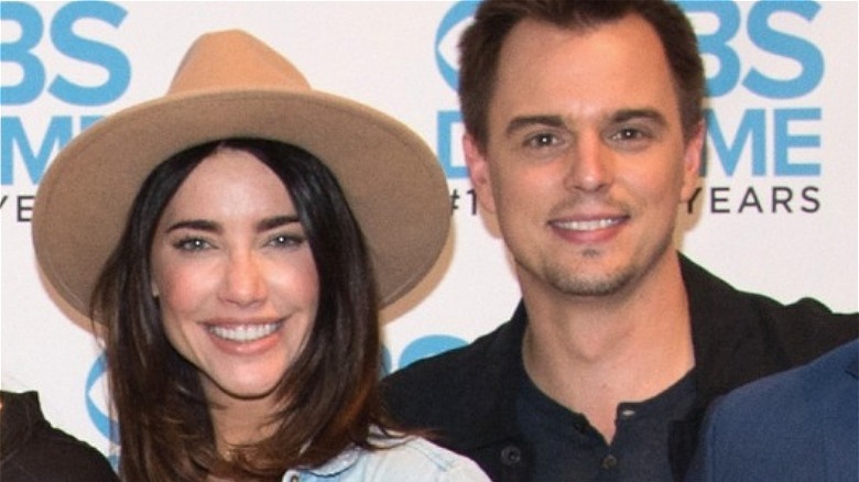 Jacqueline MacInnes Wood and Darin Brooks posing on the red carpet