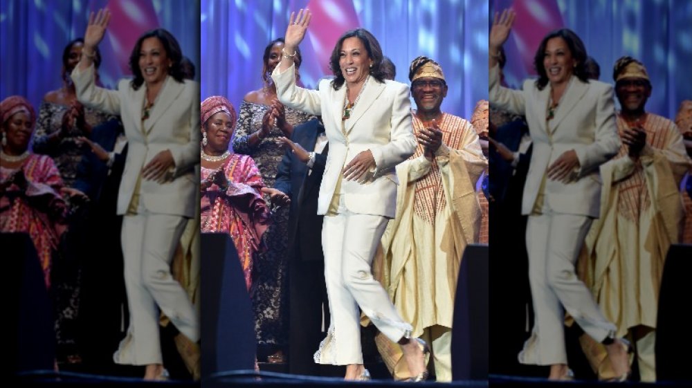 Kamala Harris in white pantsuit