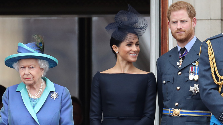 Meghan, Harry, Queen Elizabeth smiling