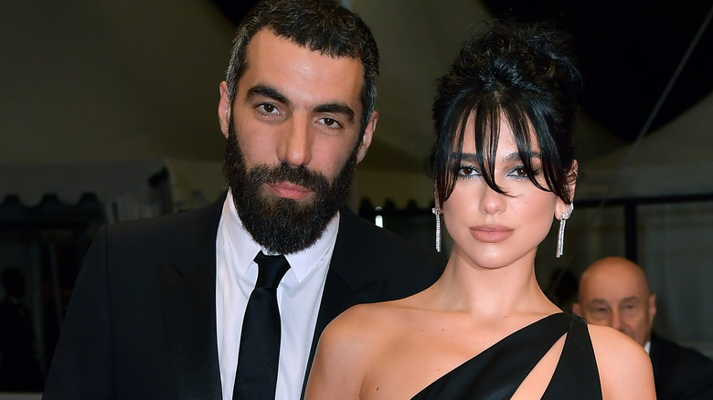 Romain Gavras and Dua Lipa posing 