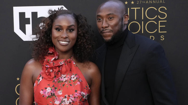 Issa Rae and Louis Diame smiling 