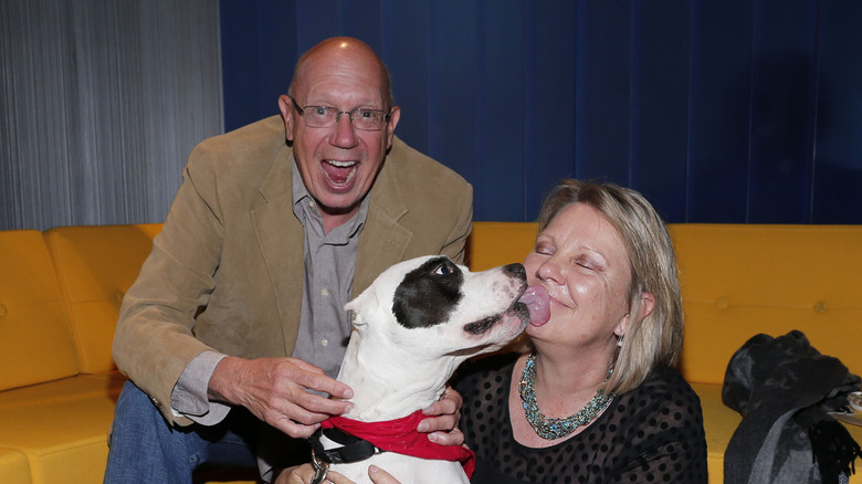 Dan Florek and Karen Florek with a dog