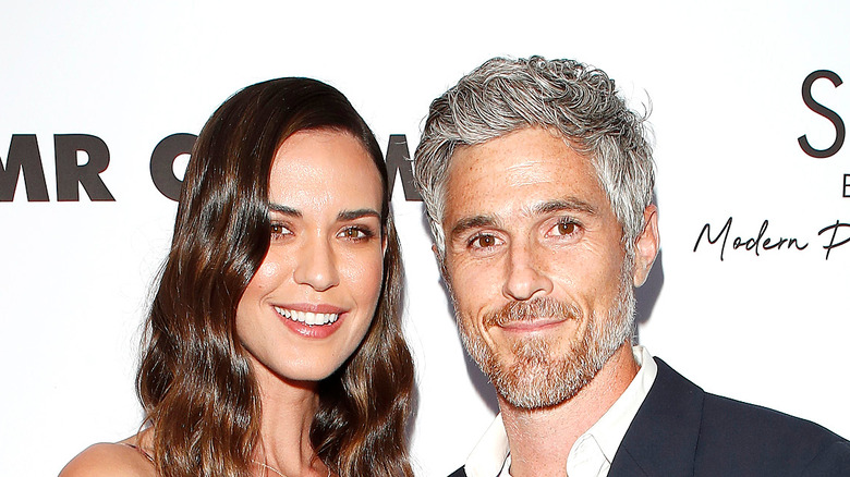 Dave, Odette Annable posing together