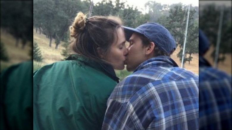 Eden Brolin, Cameron Crosby kissing 