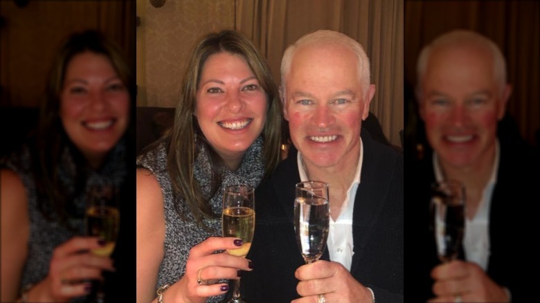 Neal McDonough toasting with wife 