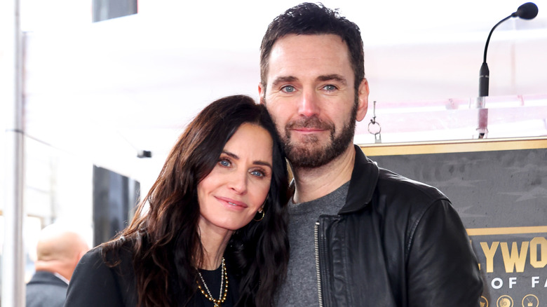 Courteney Cox and Johnny McDaid posing