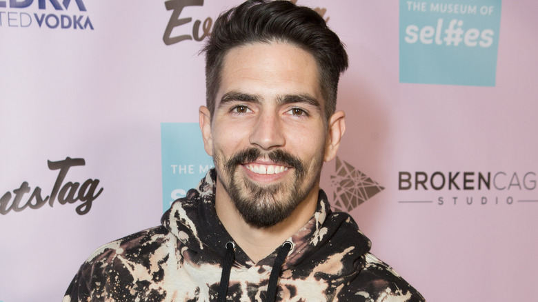 MTV's Jordan Wiseley standing on the red carpet in a hoodie