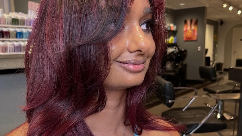 layered cherry red haircut 