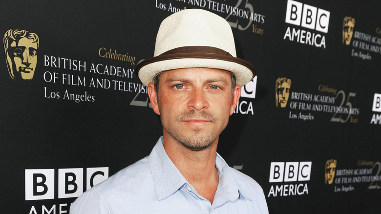 Carmine Giovinazzo in a white hat