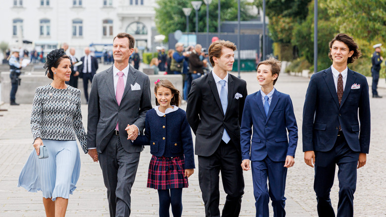 Prince Joachim and family walking and smiling