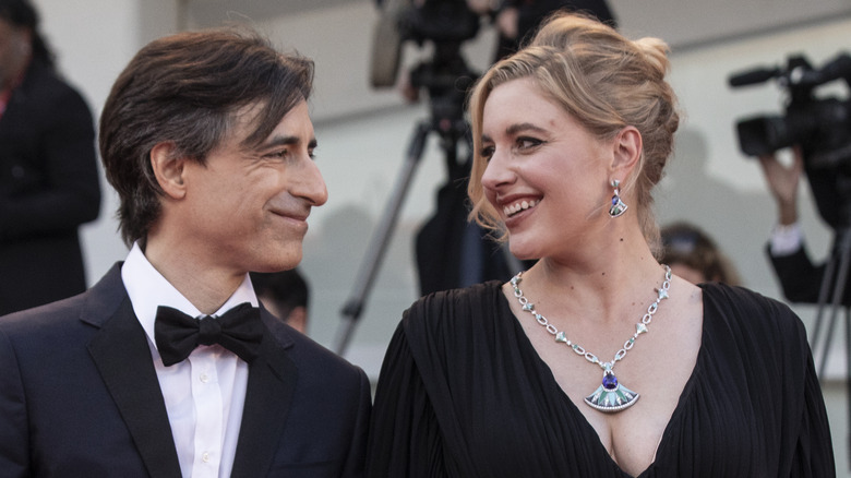 Greta Gerwig and Noah Baumbach looking at each other