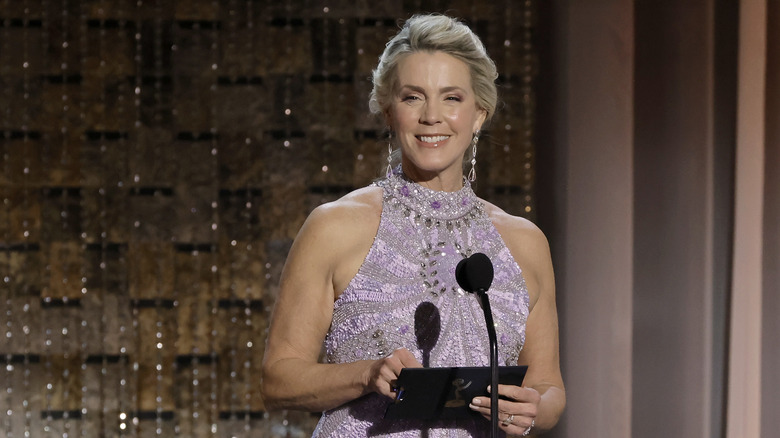 Deborah Norville smiling at microphone