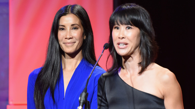 Lisa and Laura Ling speaking on stage