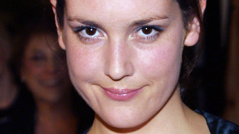 Young Melanie Lynskey smiling