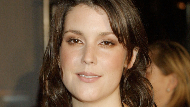 Young Melanie Lynskey smiling