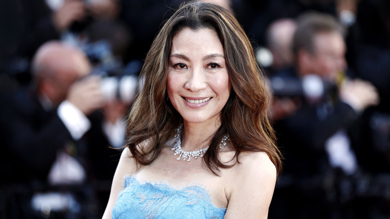 Michelle Yeoh blue off-shoulder dress 