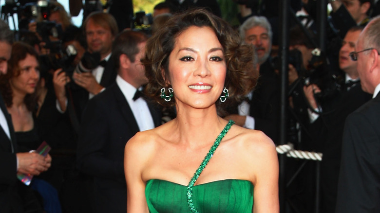 Michelle Yeoh off-shoulder green dress