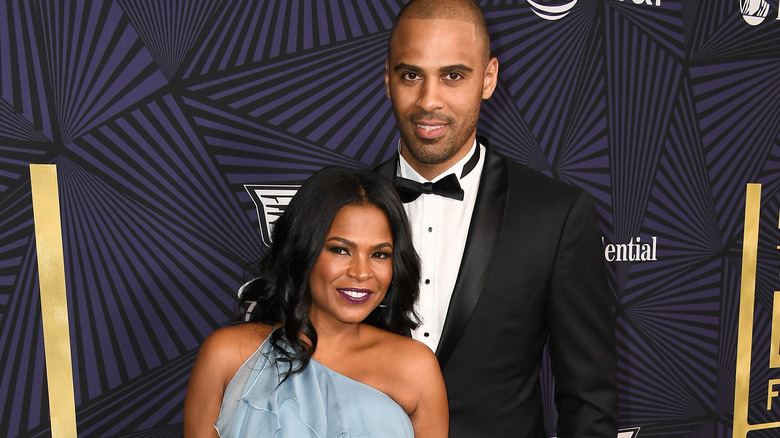 Nia Long and  Ime Udoka posing 