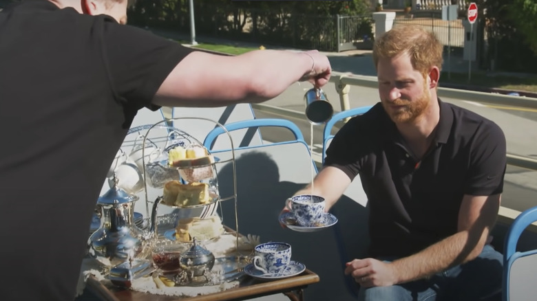 James Corden serves Prince Harry tea