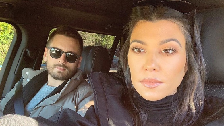 Scott Disick and Kourtney Kardashian in car