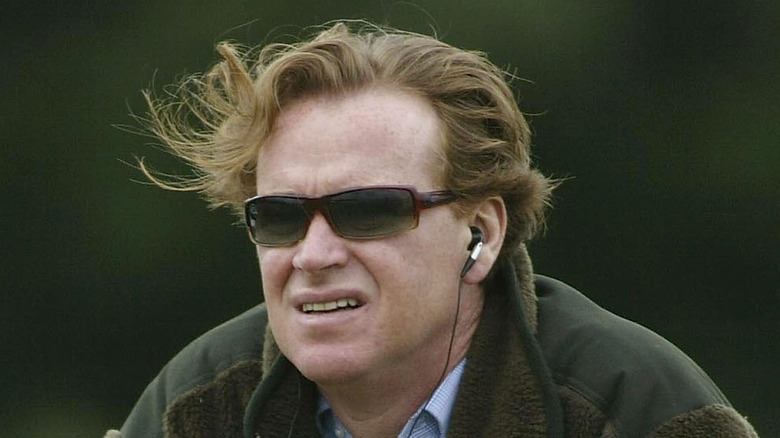 James Hewitt wearing shades and headphones