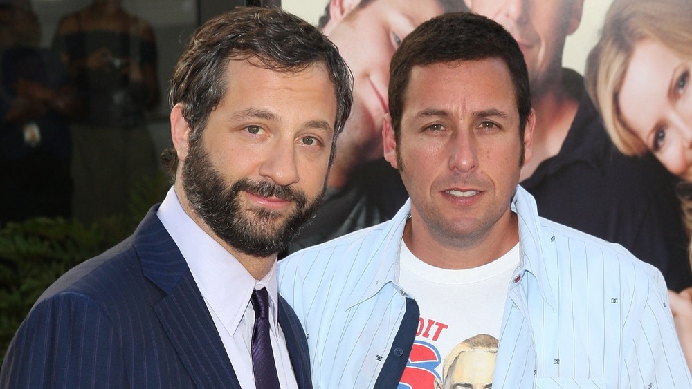 Adam Sandler and Judd Apatow pose at an event