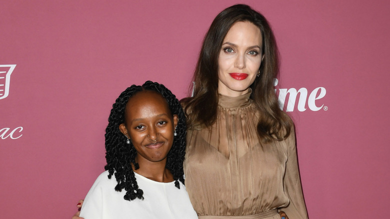 Zahara Jolie and Angelina Jolie posing