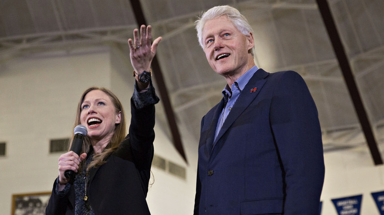 Chelsea Clinton and father Bill Clinton at an event