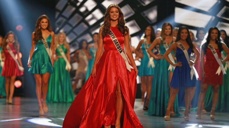 Madison Nipe in orange gown at Miss USA 2018