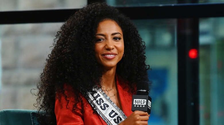 Miss USA 2019 Cheslie Kryst holding mic