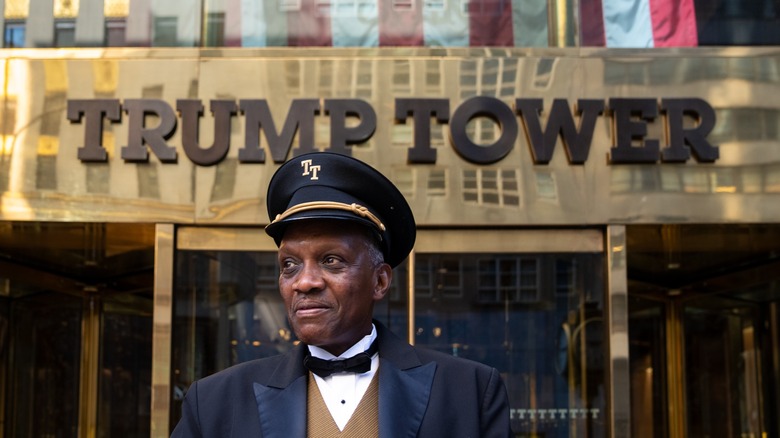 Doorman smiling outside Trump Tower