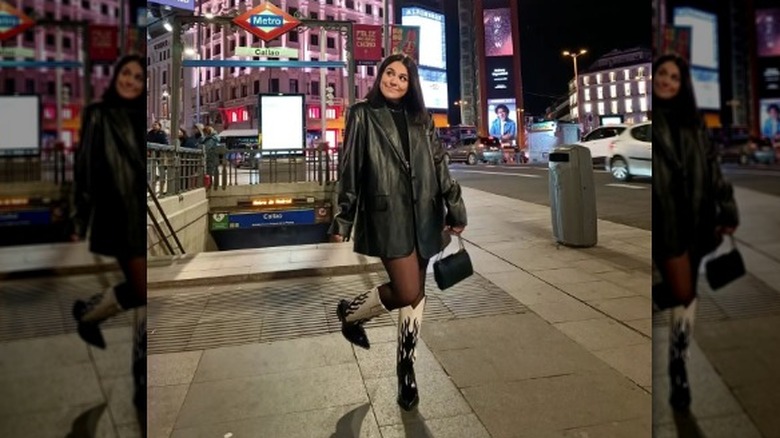 Black outfit with black and white cowboy boots