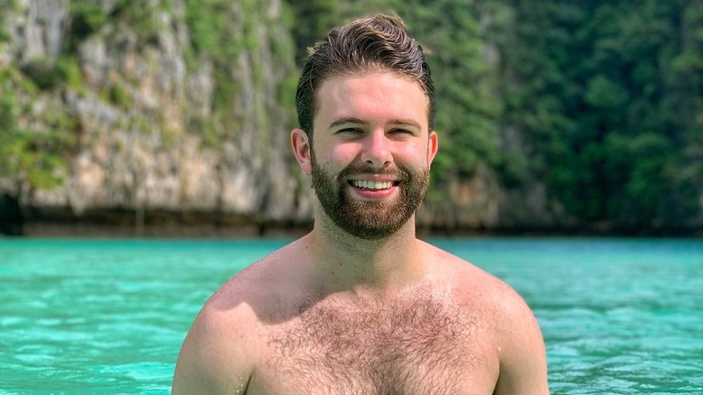 Luke Rockwell smiling in water