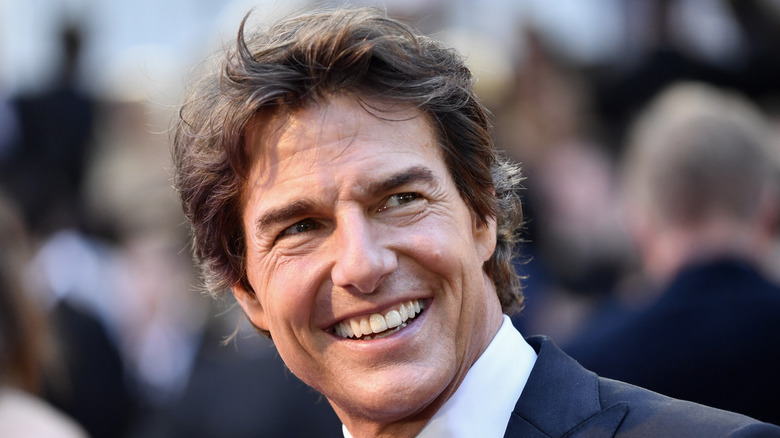 Tom Cruise smiling at premiere