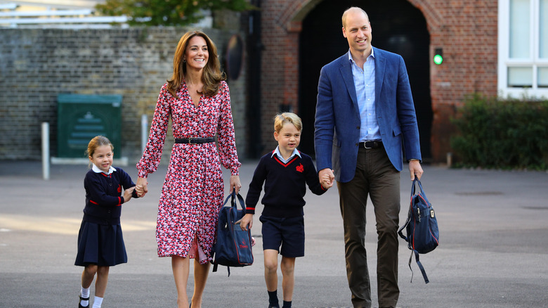 Princess Charlotte arrives for her first day of school, with her brother Prince George and her parents the Duke and Duchess of Cambridge, at Thomas's Battersea in London on September 5, 2019